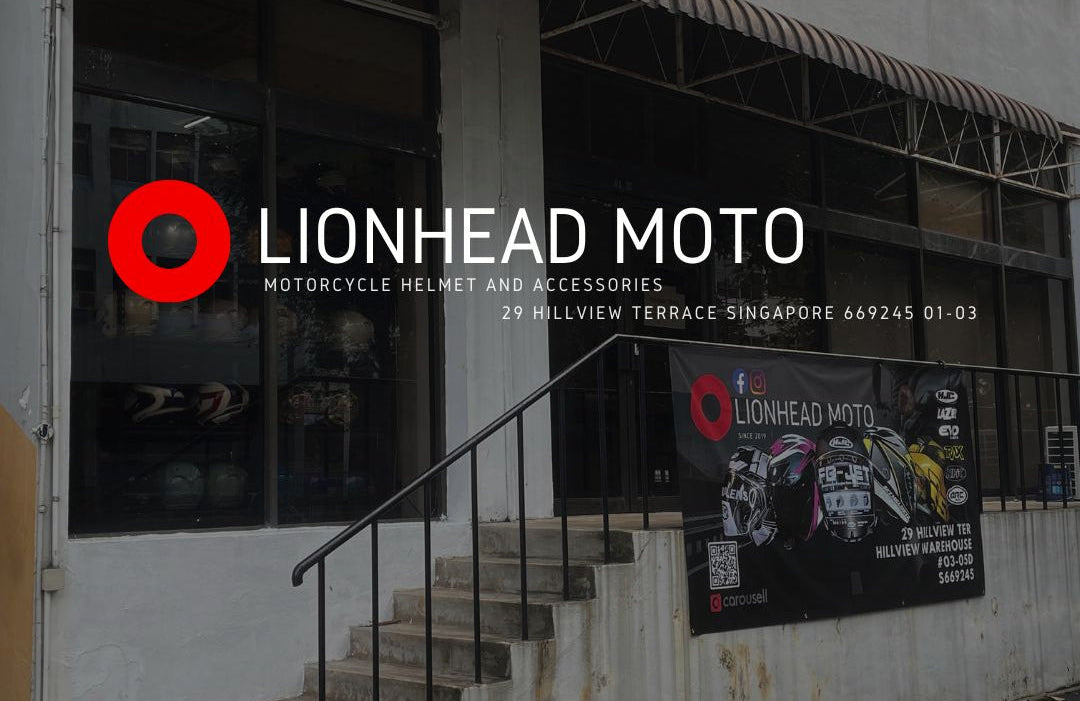 Lionhead Moto store front with logo and contact information displayed.
